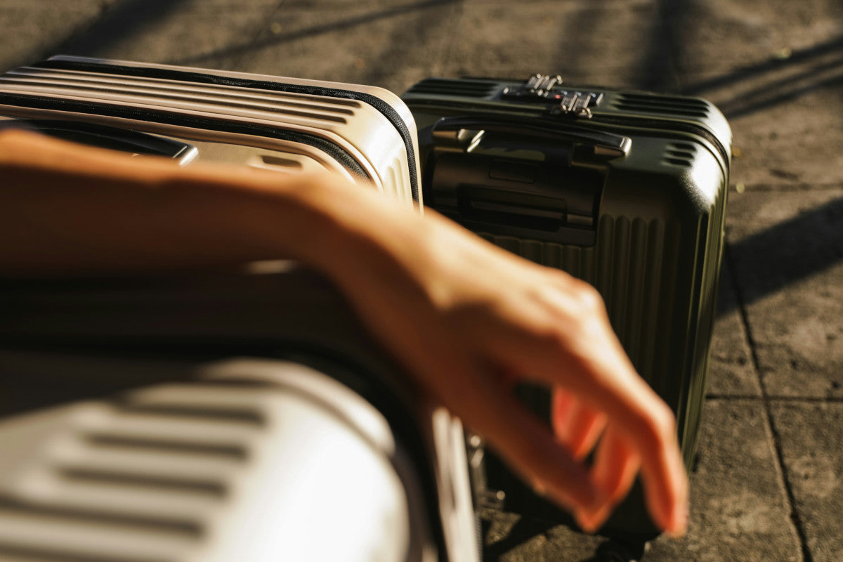 july vs away luggage