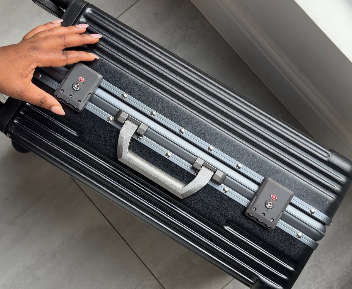 NOBL traveler rolling through arrivals with both hands free