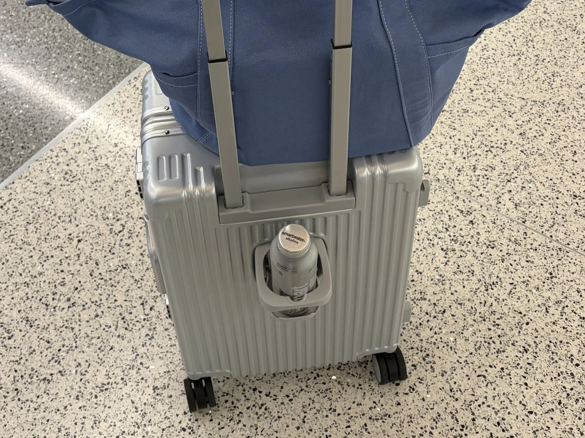 Before and after NOBL comparison showing hands-free airport travel