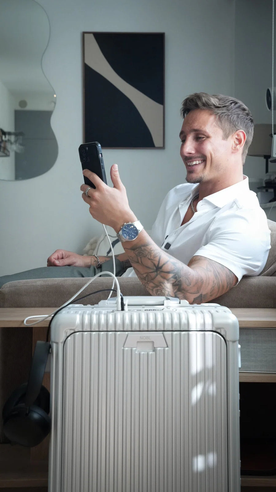 Woman traveling with rose-gold luggage