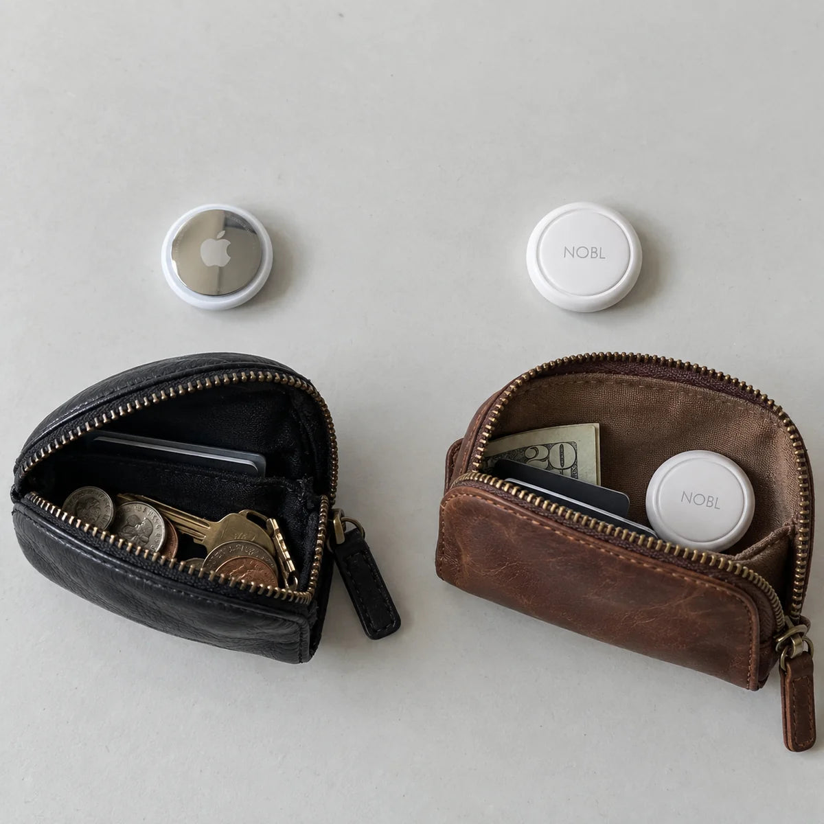 NOBL Air™ and AirTag shown beside travel pouches
