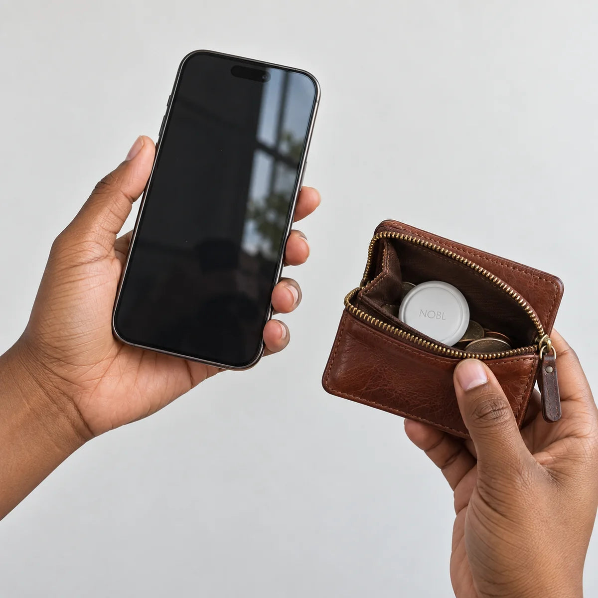 Phone beside NOBL Air™ in a roomy zip wallet