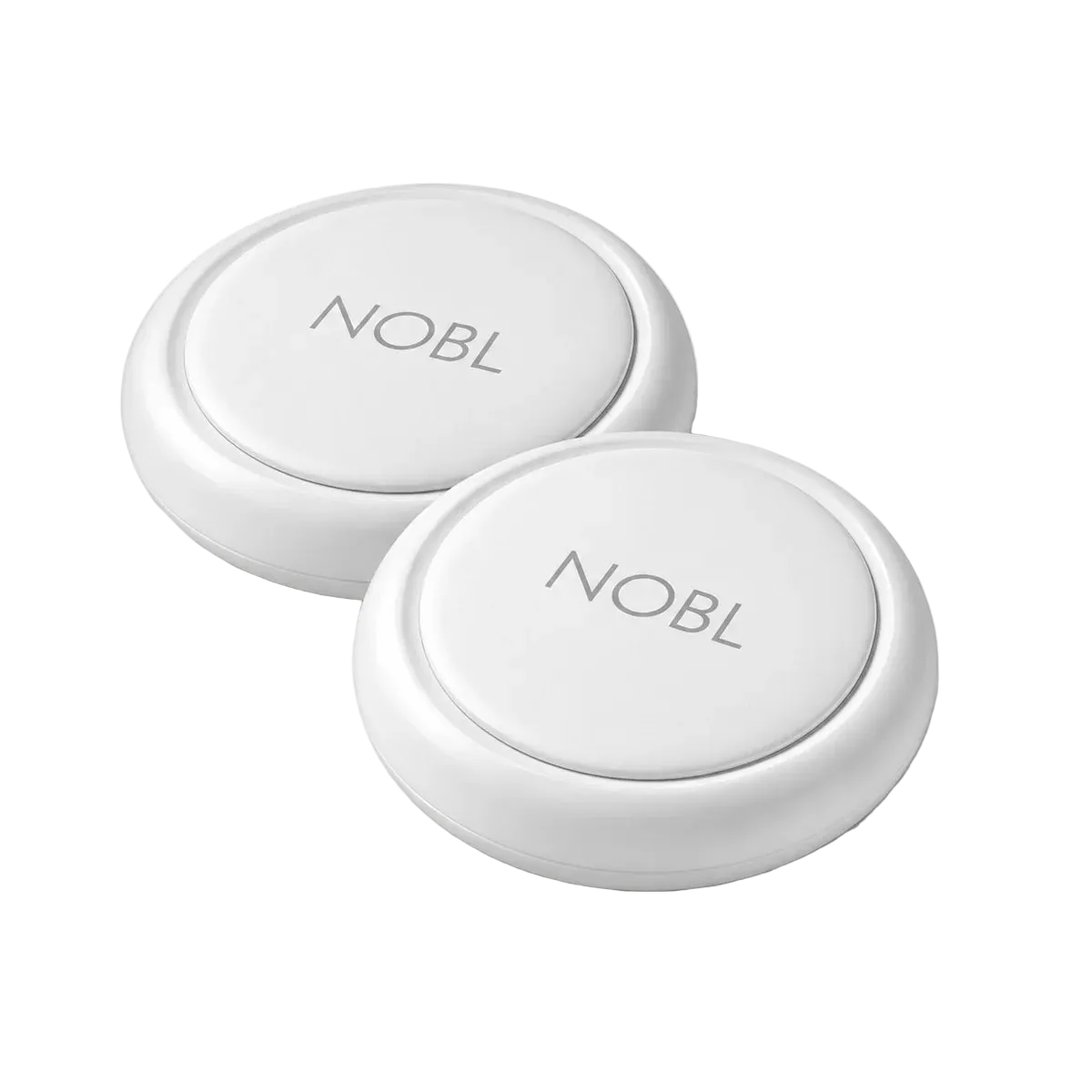 Two white round NOBL Air™ trackers